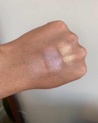 Laura Mercier Face Illuminator Highlighting Powder indiscrection devotion addiction swatches on dark skin