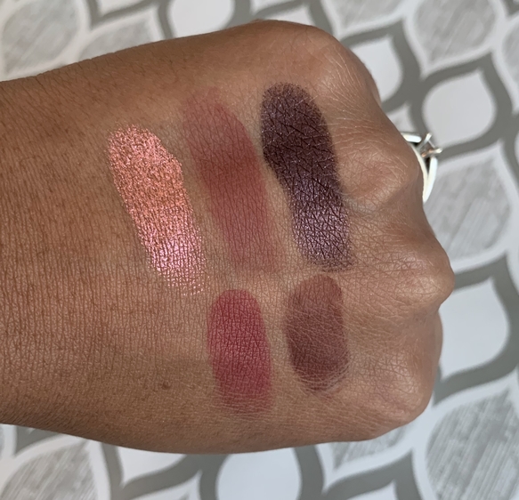 Coloured Raine x Power Eyeshadow Palette swatches on medium dark skin (revenge, deception, alibi, betrayal, testify)