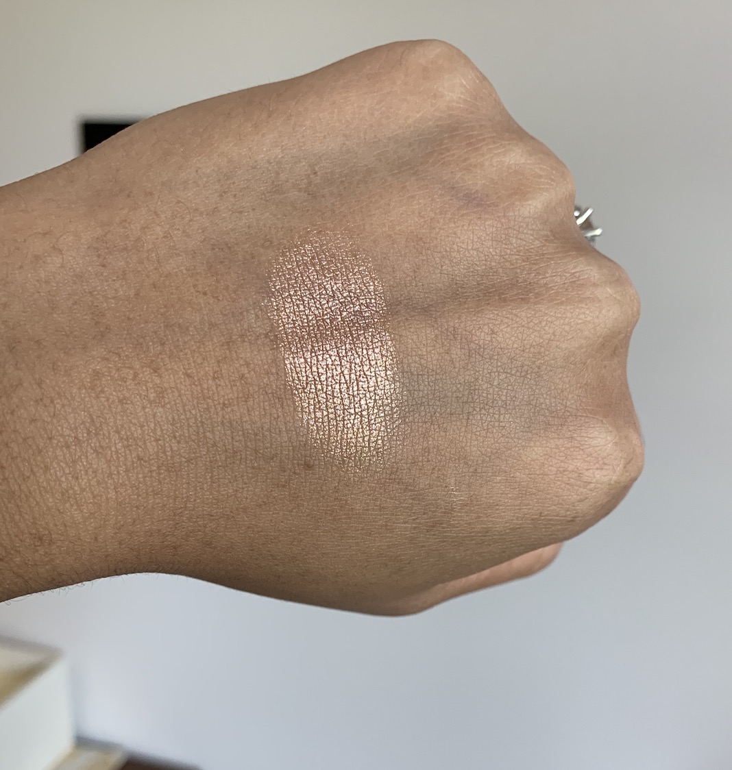 Milani Baked Highlighter 130 Rose Italiana Swatch on dark skin