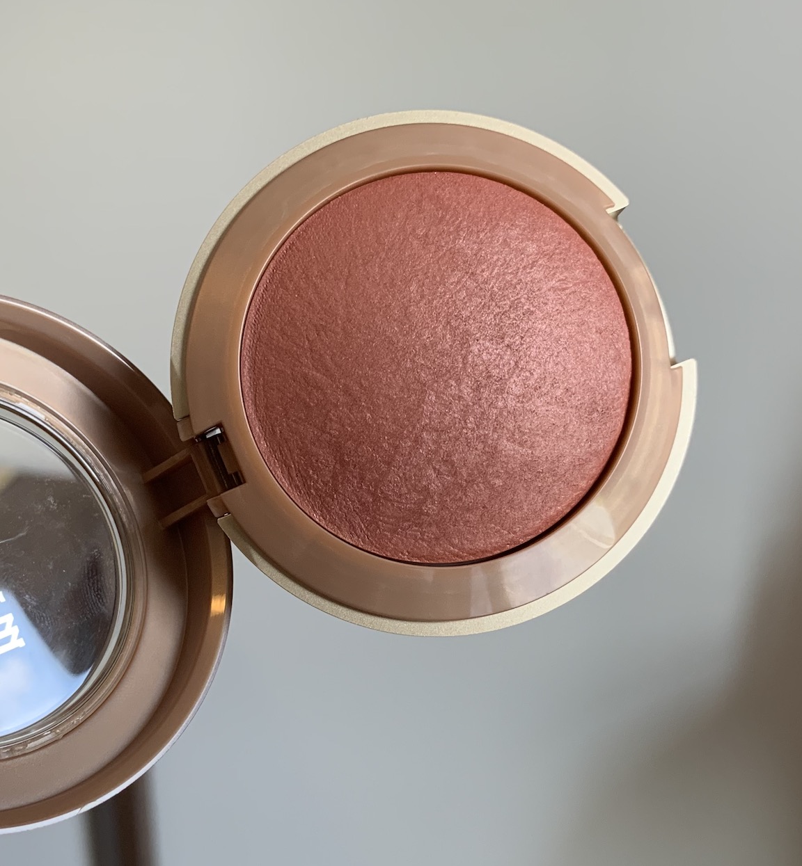 Milani Baked Powder Blush in Sunset Passione Swatch
