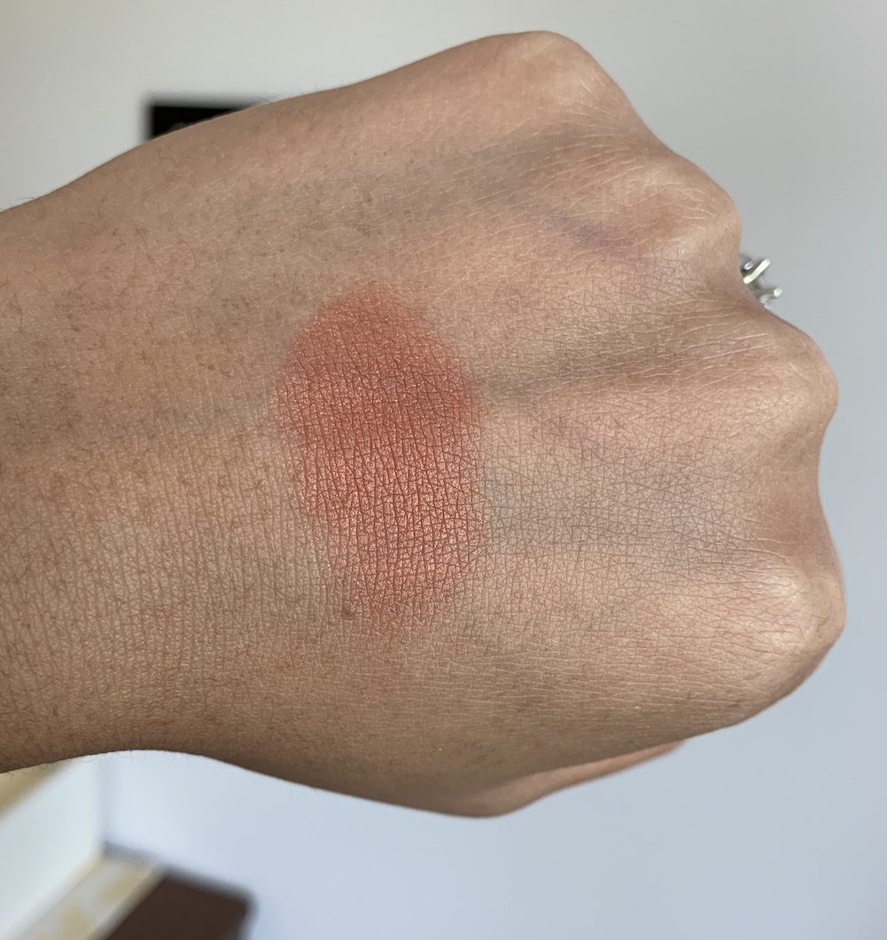 Milani Rose Powder Blush in Spiced Rose Swatch on medium dark skin