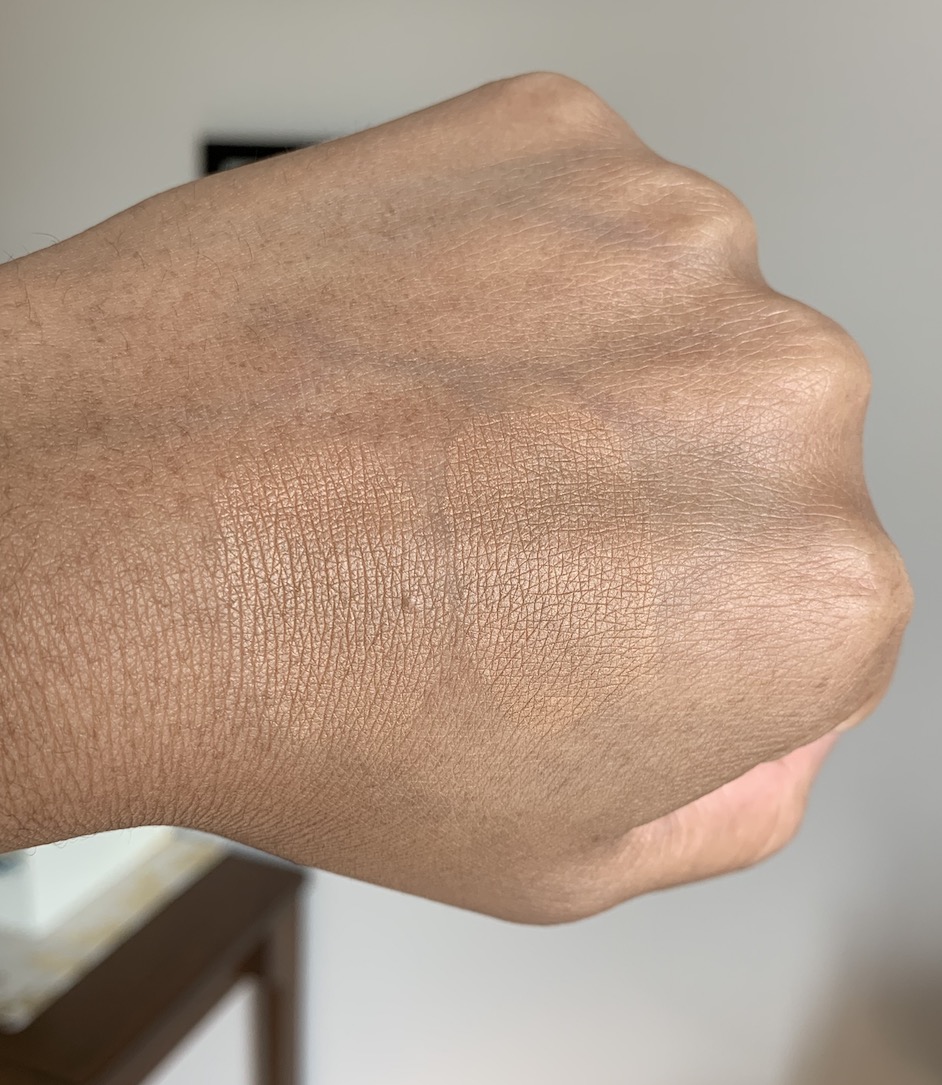 Laura Mercier Candleglow Sheer Perfecting Powder Shades 4 and 5 Swatches on medium dark skin