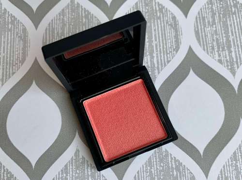 NARS Orgasm X Blush Swatch on medium dark skin (sample size)