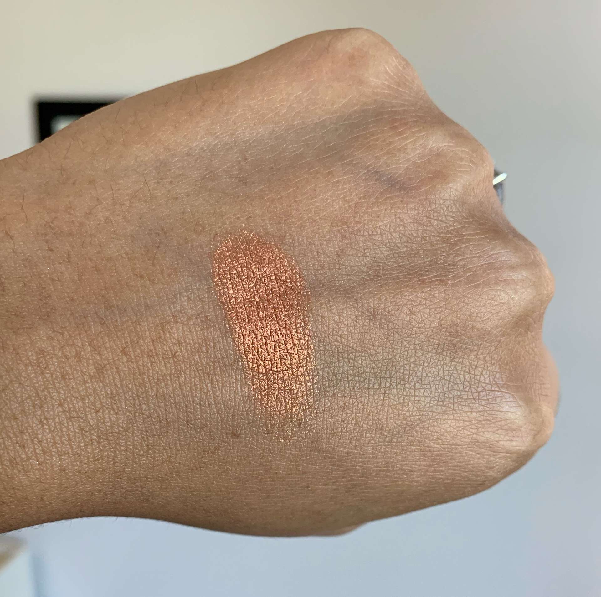 MAC Dazzleshadow Extreme in Couture Copper Swatch on Medium Dark Skin