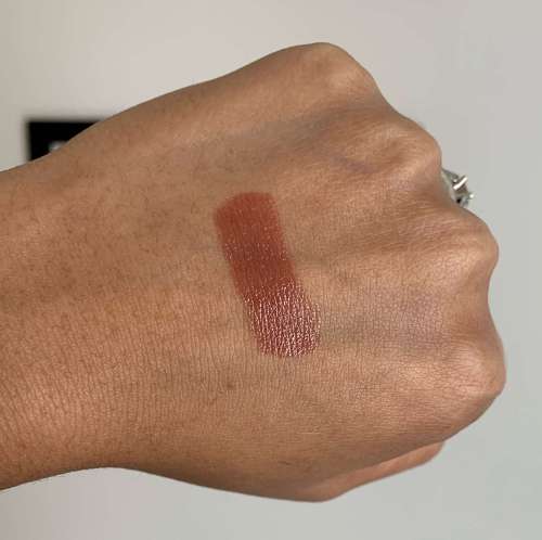 Huda Beauty Money Maker Power Bullet Cream Glow Hydrating Lipstick Money Maker Swatch on Medium Dark Skin