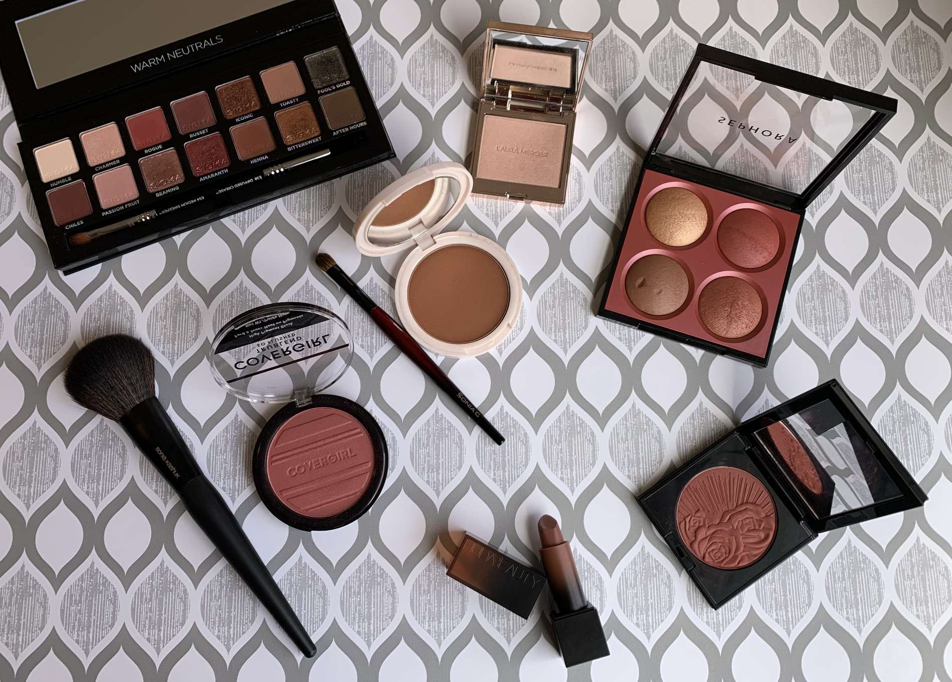 Sigma Warm Neutrals, Laura Mercier Rose Glow, Sephora Captivate, Coloured Raine Cinna Bae, Sonia G Builder Pro, Covergirl Sweet Seduction, Sonia Kashuk Medium Powder, Huda Beauty Money Maker, Pat McGrath Paradise Venus 