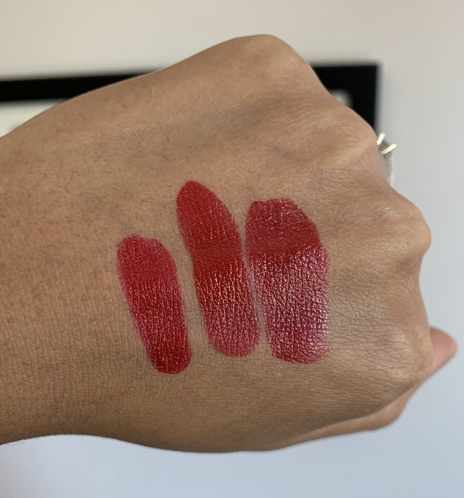 L to R: MAC Red Lipstick (satin finish), Armani Lip Power 400, MAC E For Effortless (Love Me Formula) Swatches Medium Dark Skin