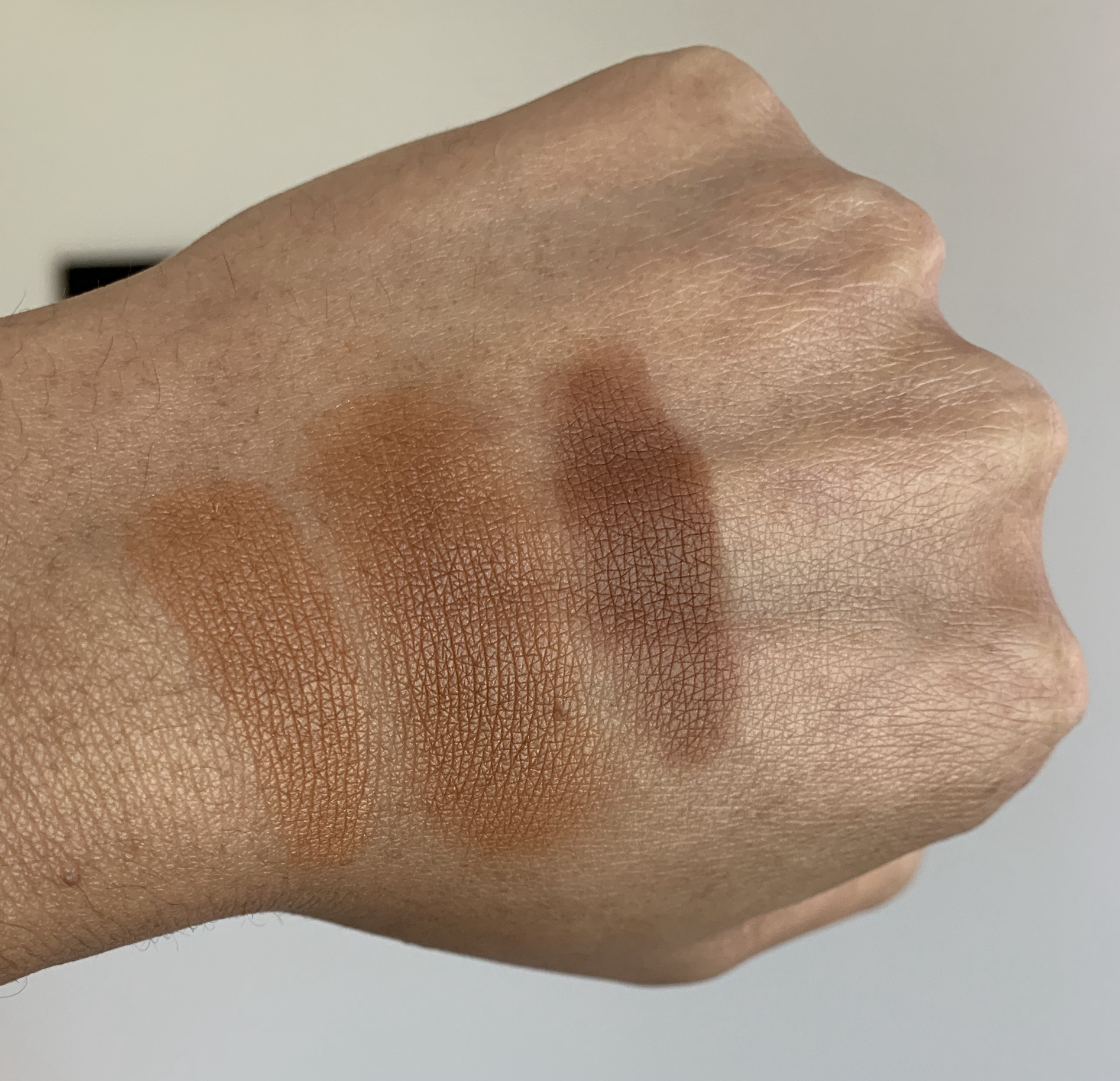 Covergirl Trublend So Flushed High Pigment Bronzers 420 Warmth and 400 Ebony Swatches on Medium Dark Skin