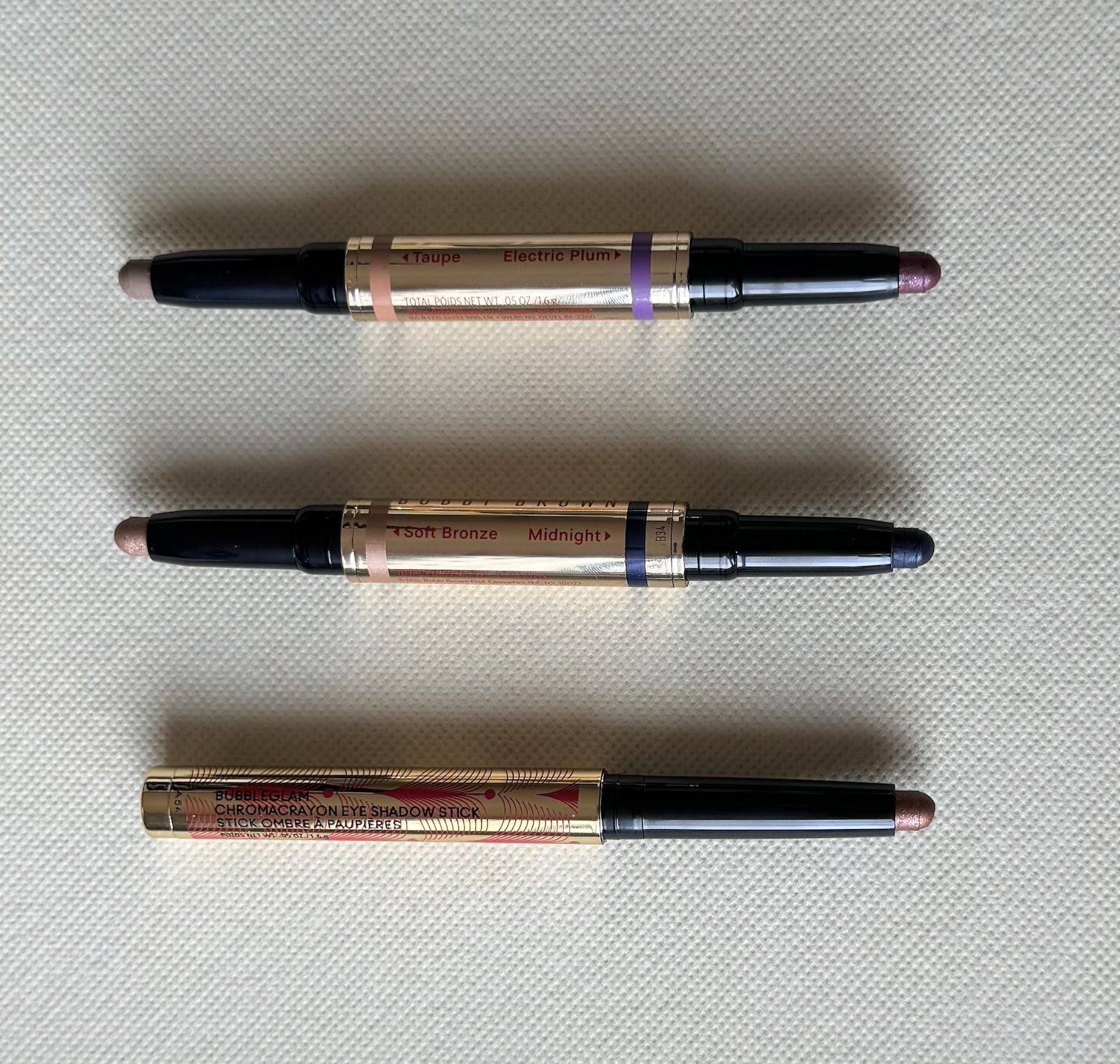 Bobbi Brown Dual Ended Long Wear Cream Shadow Sticks Electric Plum, Taupe, Soft Bronze, Midnight and MAC Chromacrayon Bubbleglam Eye Shadow Stick Swatches