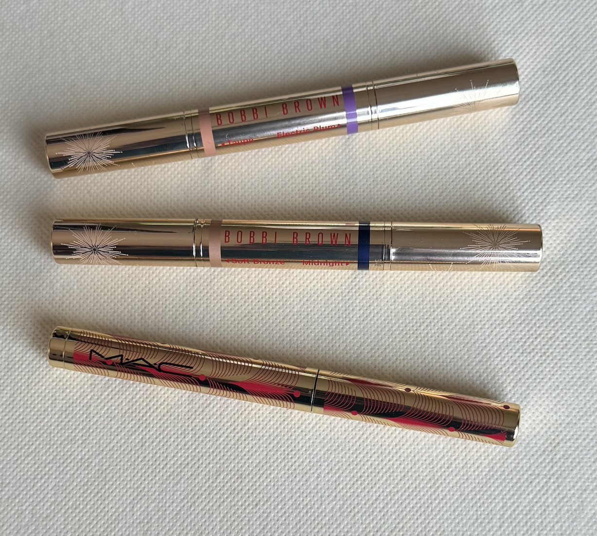 Bobbi Brown Dual Ended Long Wear Cream Shadow Sticks Electric Plum, Taupe, Soft Bronze, Midnight and MAC Chromacrayon Bubbleglam Eye Shadow Stick Swatches